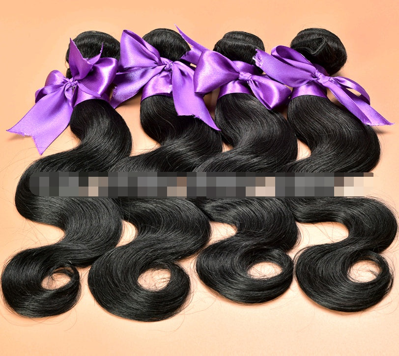 Black hair extensions with purple bows on a beige background