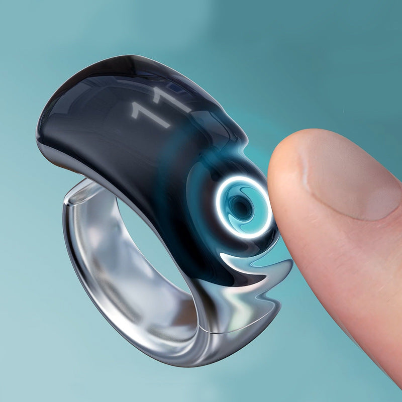Smart ring with digital display on a finger against a teal background