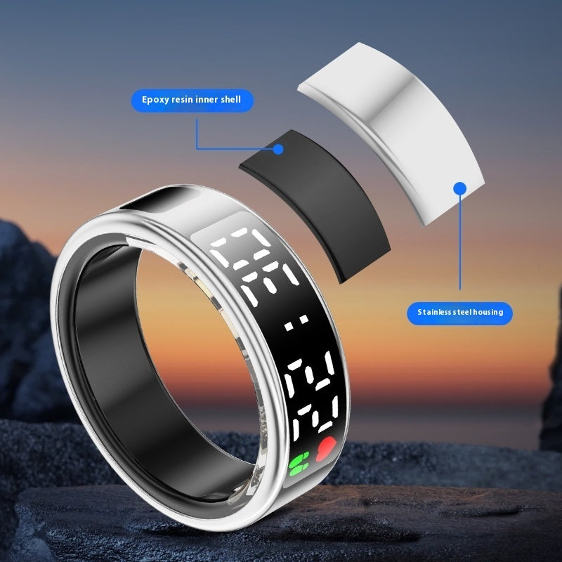 Smart ring with digital display on a sunset background