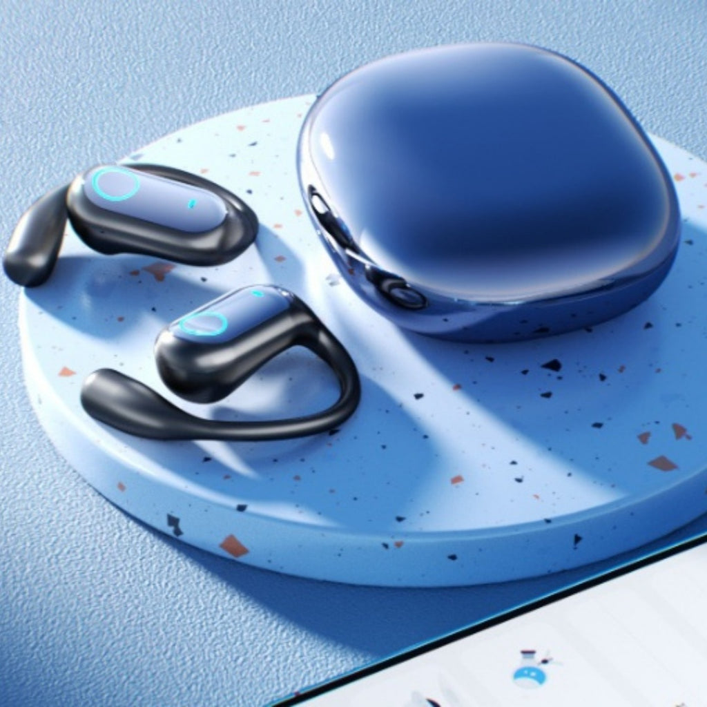 Wireless earbuds with charging case on a blue speckled surface